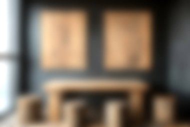 Bu resim, ahşap mobilyalar ve minimalist duvar sanatının yer aldığı samimi, çağdaş bir iç mekan sergiliyor. Doğal ışık, şık yaşam ya da çalışma alanı tasarımları için mükemmel olan davetkar atmosferi arttırır..