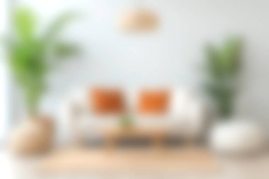 Güzel, modern bir oturma odası, minimal dekor, turuncu yastıklı rahat bir kanepe, şık iç mekan bitkileri, ve sıcak doğal ışık, sakin bir atmosfer yaratıyor..