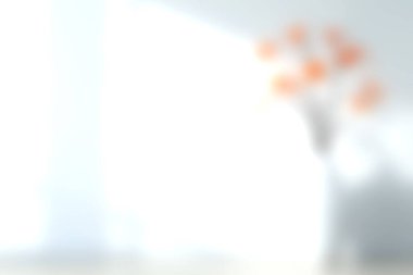 Çağdaş bir vazoda odak noktasından portakal çiçekleri içeren sakin ve parlak bir görüntü, iç tasarım ilhamı için rahatlatıcı ve sanatsal bir atmosfer yaratıyor..