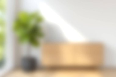 Modern mobilyaların, parlak doğal ışığın ve rahatlama ve ilham için mükemmel dekoratif bir bitkinin yer aldığı sakin ve şık bir iç mekan deneyin..