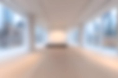 Geniş pencereli boş bir minimalist oda doğal ışığın boşluğu doldurmasına izin veriyor, sakin ve davetkar bir atmosfer yaratıyor çeşitli kullanımlar için mükemmel..