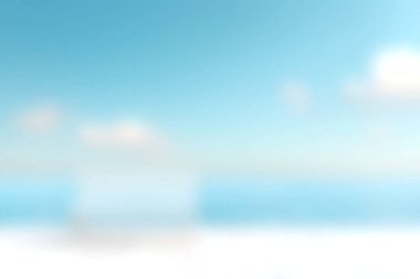 Sakin bir okyanusun üzerinde yumuşak bulutlarla süslenmiş açık mavi bir gökyüzünün olduğu güzel bir sahil manzarası, rahatlama ve açık hava ilhamı için idealdir..