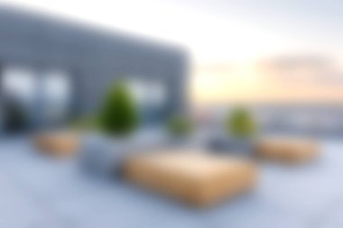 Şık bir oturma ve canlı yeşillik içeren, gün batımında rahatlamak için mükemmel bir çatı terası. Güzel şehir manzarası ve dingin atmosferin tadını çıkar..