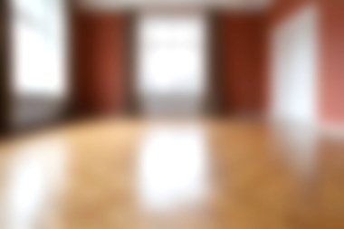 Bu görüntüde parlak ve ferah bir oda var. Parlak ahşap zemin ve parlak kırmızı duvarlar. Tasarım ilhamı için ideal.