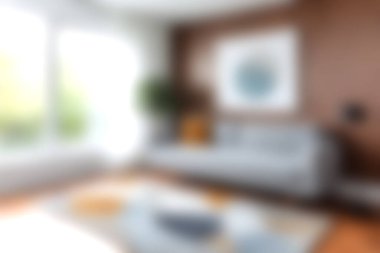 Gri bir kanepe ve şık dekorasyon unsurları olan, rahatlama ve yaratıcı ilham için mükemmel, parlak, modern bir oturma odası. Doğal ışık sıcak atmosferi güçlendirir..