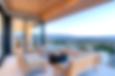 Modern mobilyaların yer aldığı, nefes kesici bir dağ manzarasının keyfini çıkarırken rahatlamak için mükemmel tasarlanmış bir açık hava yaşam alanı..