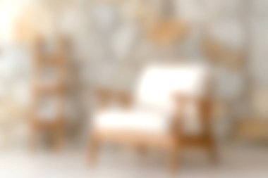 Sıcak, ahşap bir sandalye, bulanık taş bir duvar ve doğal ışıklandırmayla karakterize edilmiş şık bir iç mekanı iyileştirir ve rahatlatıcı bir atmosfer yaratır. Modern dekor için ideal.