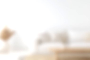 Bu dingin oturma odasında, parlak doğal ışık, yumuşak dokular ve rahatlatıcı atmosfer ile rahatlama ve rahatlama davet eden minimalist bir tasarım var..