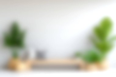 Canlı bitkiler ve doğal ahşap mobilyalarla, sakin ve davetkar bir atmosfer yaratan, minimalist bir düzeneği gösteren modern bir iç tasarım..