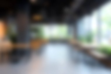 Minimalist tasarım elementleri ve doğal ışık içeren parlak ve havadar bir ofis. Profesyonel çalışma ortamlarını ve yaratıcılığı göstermek için ideal.