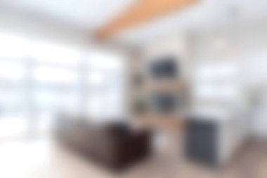 Modern dekorun, rahat mobilyaların ve açık bir mekanın olduğu parlak ve şık bir oturma odası. Oda, doğal ışık ve zarif tasarımla rahatlamayı teşvik ediyor..