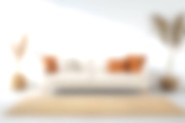 Dekoratif yastıklarla süslenmiş şık bir kanepenin, zarif bitkilerin ve rahat bir atmosferin olduğu modern bir oturma odası keşfedin. Rahatlamak için mükemmel..