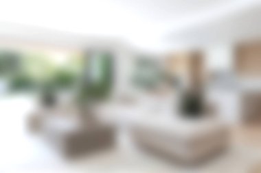 Konforlu mobilyalar ve doğal elementlerle donatılmış güzel tasarlanmış modern bir oturma odası. Hoş bir atmosfer için bol ışık ve şık bir dekor..