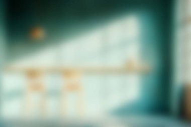 Yumuşak ışığın geniş pencerelerden içeri aktığı, rahat ve minimalist bir atmosfer yaratan, rahatlama ve ilham veren sakin bir iç mekan..