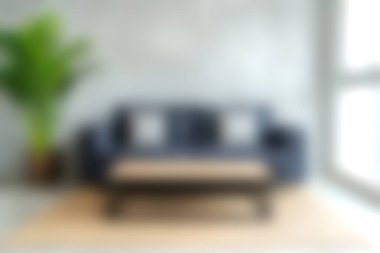 Yeşil bir bitkiyle eşleştirilmiş rahat bir kanepenin bulunduğu modern bir oturma odası, şık ve davetkar bir iç mekan sunuyor. Dekor ilhamı için ideal.