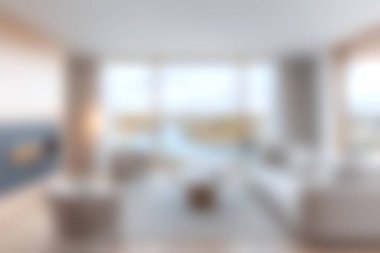 Bu modern oturma odasında geniş pencereler var, doğal ışıkla kaplanmış, doğanın manzarasını gözler önüne seriyor. Konforlu mobilyalar ve şık dekorlar rahatlama ve aile toplantıları için mükemmel bir ortam yaratıyor..