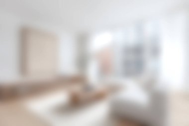 Minimalist dekorlu modern mobilyaların sergilendiği parlak ve ferah bir oturma odası. Bölge doğal ışık ve rahatlama için ideal rahat bir ortam içeriyor..