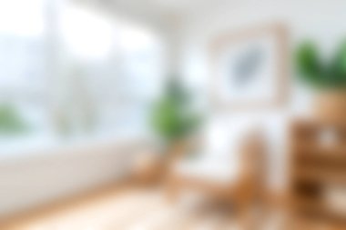 Parlak ve havadar modern bir oturma odasında minimalist dekorlar ve doğal elementler var. Rahatlamak için mükemmel bir davet ve huzur alanı yaratıyorlar..