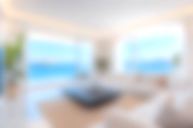 Parlak ve havadar modern bir oturma odası geniş pencerelerden çarpıcı bir okyanus manzarası sergiliyor, dingin ve davetkar bir atmosfer yaratıyor rahatlama ve keyif için mükemmel..