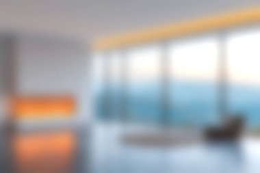 Rahat bir şömine ve manzarayla tamamlanmış doğal ışığı davet eden geniş pencereli modern bir oturma odası. Rahatlamak için mükemmel..