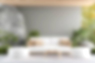 Yastıklı beyaz bir kanepe, zarif iç mekan bitkileri ve hafif ahşap detaylarla donatılmış şık bir minimalist oturma odası. Modern rahatlama için mükemmel..