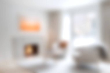 Yumuşak ışıklandırma ve minimalist dekorla tasarlanmış rahat ve modern bir oturma odasının cazibesini deneyin. Davetkar alan zarif mobilyalar ve sanatsal aksanlar içeriyor..