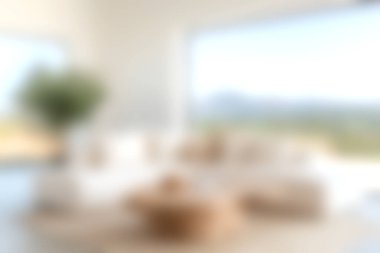 Parlak ve modern bir oturma odasında minimalist tasarım elementleri, rahat koltuklar, yumuşak yastıklar ve davetkar bir açık hava manzarası bulunur..