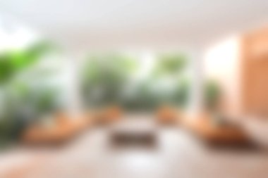 Salonda sakin bir yaşam alanı doğal ışık, minimalist mobilyalar ve yeşillik sergiliyor. Rahatlamak için mükemmel ve modern bir estetik konfor ve tarzı kucaklıyor..