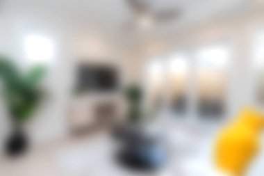 Modern dekorun, iç mekan bitkileriyle harmanlandığı şık bir oturma odası deneyin. Rahatlamak ve sosyalleşmek için mükemmel, parlak ve davetkar bir atmosfer yaratın..