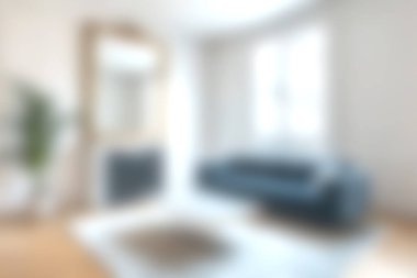 Geniş ve parlak oturma odası şık bir kanepe, büyük bir ayna ve zarif bir dekor içeriyor. Modern bir dokunuşla rahatlamak için mükemmel bir yer..