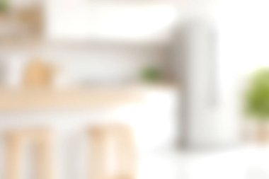 Minimalist elementlerle tasarlanmış, parlak ve davetkar bir mutfak. Doğal dekor, sıcak tonlar ve modern yaşam için mükemmel, temiz bir estetik..