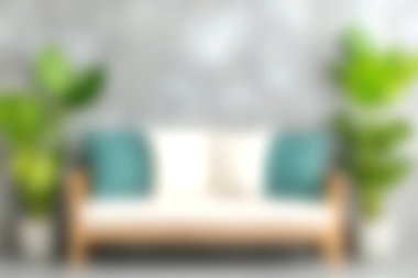 Yumuşak yastıklarla süslenmiş şık bir kanepenin olduğu rahat minimalist bir oturma odası. Bereketli yeşil bitkiler zarif dekora hayat ve cazibe katarak sakin bir ortam yaratıyor..