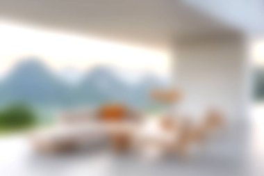 Bu resim, sakin bir ortamda muhteşem dağ manzaralarıyla çevrili zarif mobilyalarıyla modern bir açık hava salonu sergiliyor. Rahatlamak için mükemmel..