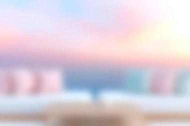 Yumuşak tekstil, pastel yastıklar ve nefes kesici bir günbatımı arka planının olduğu rahat, modern bir yaşam alanı. Rahatlamak ve ilham vermek için mükemmel..