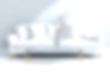 Zarif tasarım unsurları olan şık beyaz bir kanepenin bulunduğu sakin, minimalist bir oturma odası. Konfor ve modern dekor estetiği için mükemmel..