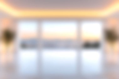 Geniş pencereli, güzel tasarlanmış modern bir oturma odası. Ufuk çizgisinde çarpıcı bir günbatımı manzarası var. Rahatlamak ve ilham vermek için mükemmel..