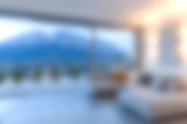 Geniş pencerelerden muhteşem bir dağ manzaralı modern bir oturma odası. Tasarım yumuşaklık ve sükuneti vurgular, rahatlamak için idealdir..