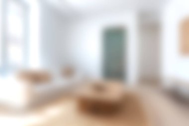 Modern minimalizmle tasarlanmış geniş ve davetkar bir oturma odası keşfedin. Rahat mobilyalar ve rahatlatıcı bir atmosfer için bol miktarda doğal ışık..