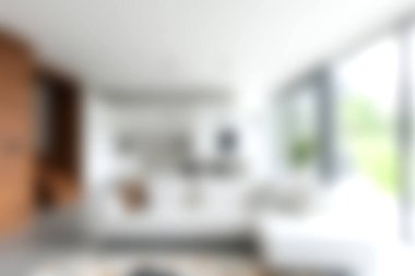 Doğal ışık için geniş pencereler, rahat mobilyalar ve modern tasarım içeren parlak ve modern bir oturma odası keşfedin. Rahatlamak için davetkar bir ortam yaratın..