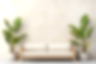 Bu güzel oturma odası sahnesinde yemyeşil bitkilerle bej renkli rahat bir kanepe var. Nötr arka plan rahatlatıcı atmosferi arttırır. Rahatlamak için mükemmel..