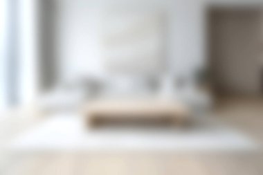 Açık renkli, doğal ahşap aksanlı ve sakin bir atmosfer için basit mobilyaları olan minimalist bir tasarımı olan huzurlu ve rahat bir modern oturma odası..