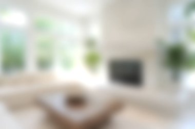 Bu parlak ve havadar oturma odasında modern bir tasarım var. Bol miktarda doğal ışık, şık mobilyalar ve canlı bitki dekoru, davetkar bir atmosfer yaratıyor..