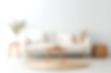 Huzurlu bir oturma odası sahnesi yumuşak bir kanepe, yuvarlak bir halı ve rahat bir ev ortamı yaratmak için mükemmel dekorlar sergiliyor..