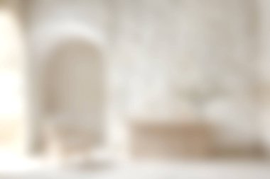 Yumuşak bir odak, ahşap mobilyalar ve zarif dekorların yer aldığı minimalist bir oturma odası yakalar, sakin ve davetkar bir atmosfer yaratır..