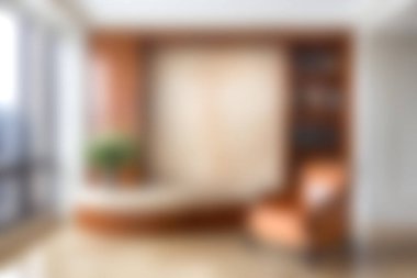 Yumuşak doğal ışığın, sıcak ahşap aksanların ve rahatlamak için rahat bir koltuğun olduğu rahat, modern bir oturma odası. Ev tasarımını öğrenmek için mükemmel..