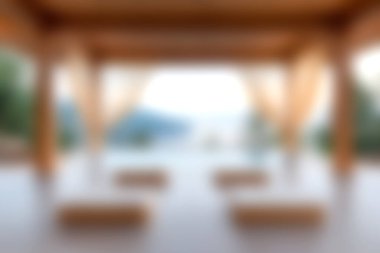 Bu resim, doğal ışıkla dolu, sakin, modern bir iç mekan yakalıyor, açık hava manzarası sunan geniş pencerelerle çerçevelenmiş, rahatlamayı teşvik eden.