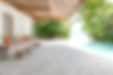 Bereketli yeşillik ve sakin su özelliklerinin arasında rahat bir oturma alanını gösteren sakin bir açık alan. Rahatlamak için mükemmel..