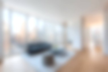 Parlak modern oturma odasında minimalist tasarım ve doğal ışıkla dolu zarif bir dekor sergileniyor. Şık ve rahat bir ortam için mükemmel..