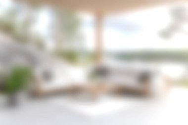 Rahat mobilyaların olduğu modern bir oturma odası keşfedin, bol doğal ışık, ve çarpıcı bir açık hava manzarası, rahatlama ve stil için mükemmel.