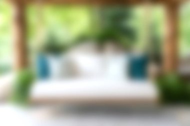 Bereketli yeşilliklerle çevrili rahat bir oturma alanı yumuşak yastıklar ve sakin bir atmosfer, rahatlama ve rahatlama için mükemmel..